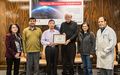 The photo is taken in Feb 2019 at Synergy Microwave Corp., New Jersey, depicts from left Dr. Ulrich Rohde standing 4th in the row, handing over plaque to Prof. Meisong Tong, IEEE AP-S Distinguish Lecturer from Region 10, Shanghai, China.